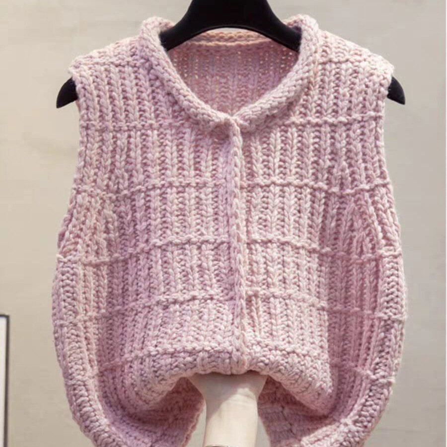 Vintage Fashion Newtown - Modieus leeftijdsverlagend dik lijnvest revers gebreid