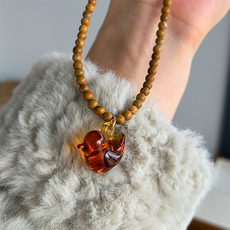 Houten kralen glazen vogelkett - Vintage Vibes Fashion recensie en prijs